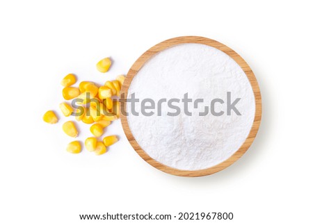 Corn starch in wooden bowl and fresh sweet corn with kernels isolated on white background. Top view. Flat lay.