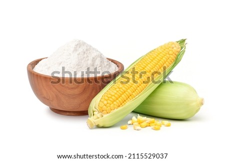 Corn starch in wooden bowl with fresh corn isolated on white background.