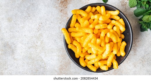 Corn Sticks Bacon Flavor Cheetos Fast Food Meal Snack On The Table Copy Space Food Background Rustic. Top View