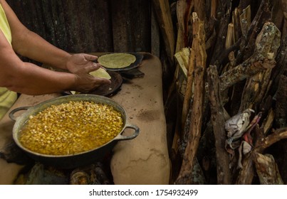 Corn Tortilla, Nixtamal, Hands Making Tortillas On Wood Fire