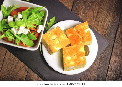 Cornbread And Salad, Healthy Meal On Plate On Rustic Table