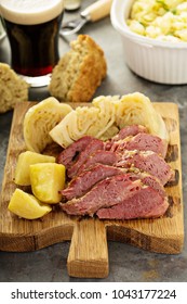 Corned beef and cabbage on a cutting board, Irish traditional dinner