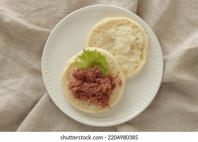 Corned Beef And Lettuce In English Muffin For Canned Food Image