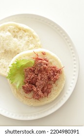 Corned Beef And Lettuce In English Muffin For Canned Food Image