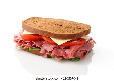 A Corned Beef Sandwich On A White Background