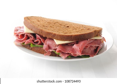 A Corned Beef And Swiss Cheese Sandwich On Rye