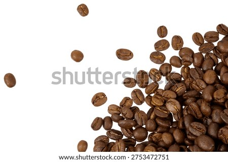 corner border of falling coffee beans pile isolated on white