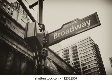 Corner of the Broadway and West 36th Street sign, New York City, USA. New York City, United States famous Broadway street sign in Manhattan, downtown New York. Vintage retro black and white.