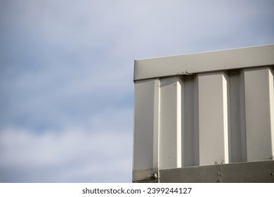corner of the building roof against the blue sky - Powered by Shutterstock