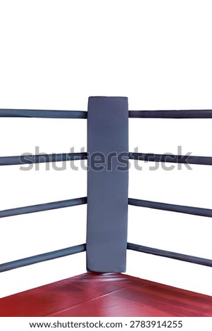 Corner of empty professional boxing ring with dark blue ropes and red mat isolated on white background, training equipment for martial arts and combat sports.