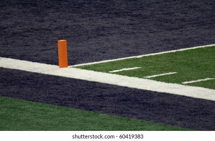 Corner Of A Football Field Blue End Zone With Orange Pylon