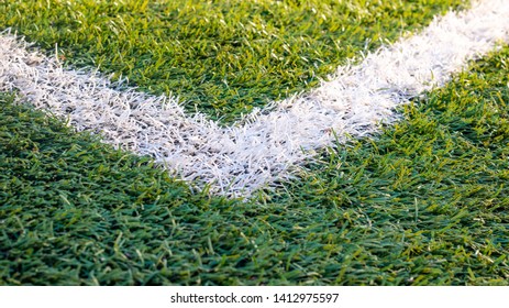 Corner Of Football Field, White Markings On Green Grass,  Corner Of A Football Field. No People And Players. Sports Concept.