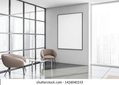 Corner Of Office Waiting Room With White And Glass Walls, Tiled Floors, Panoramic Window, Beige Armchairs Near Glass Coffee Table And Vertical Mock Up Poster. 3d Rendering