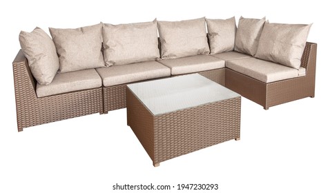 Corner Sofa And Coffee Table Isolated On White. Wicker Rattan Furniture For The Garden Or Lounge Area.