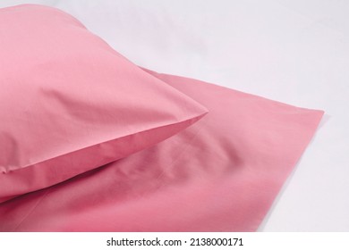 Corner Of A Soft Pillow In A New Colored Cotton Fiber Pillowcase. Satin  Material To Protect And Decorate The Pillow. Bed Linen For Home And Hotels