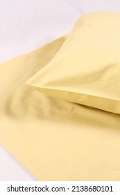 Corner Of A Soft Pillow In A New Colored Cotton Fiber Pillowcase. Satin  Material To Protect And Decorate The Pillow. Bed Linen For Home And Hotels