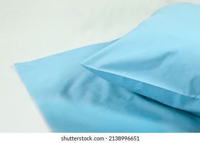 Corner Of A Soft Pillow In A New Colored Cotton Fiber Pillowcase. Satin  Material To Protect And Decorate The Pillow. Bed Linen For Home And Hotels