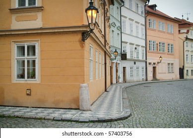 Corner of the street with stylish tenement house at Prague.