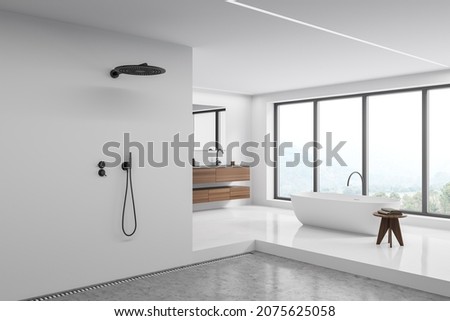 Corner view on bright bathroom interior with bathtub, shower, panoramic window, concrete floor, white walls, mirror, sink and sideboard. Concept of hygienic and spa procedures. 3d rendering