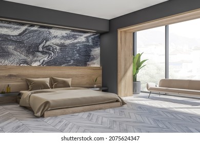 Corner view on dark bedroom interior with panoramic window, sofa, large bed, bedside and oak wooden parquet floor. Concept of scandinavian minimalist design for chill and relaxation. 3d rendering - Powered by Shutterstock