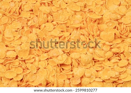 Corn-flakes background and texture. Top view. cornflake cereal box for morning breakfast.