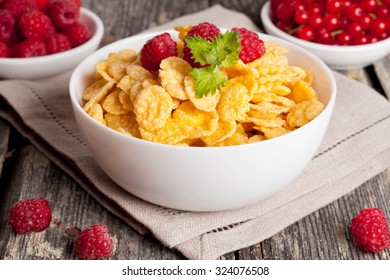 Cornflakes and different Berries, horizontal, close up
