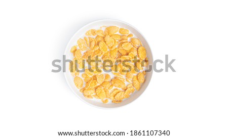 Cornflakes with milk on a white background. High quality photo