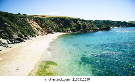 Cornish Coastline with Beautiful Beach and Turquoise Waters in Cornwall, England.