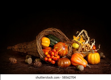 Cornucopia With Pumpkins On Brown Background