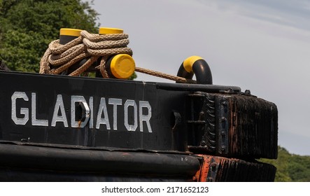 Cornwall, England, UK. 2022. The Gladiator Built 1975 538 Tons, A Tug Boat Laid Up On The River Fal In Cornwall, UK. Nameplate And Bouy Ropes.