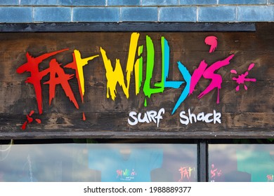 Cornwall, UK - June 4th 2021: The Fat Willys Surf Shack Logo Above The Entrance To One Of Their Stores In Cornwall, UK.