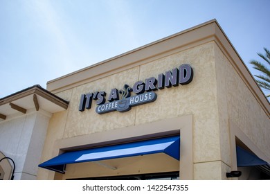 Corona, California/United States - 05/14/2019: A Store Front Sign For The Cafe Chain Known As It's A Grind Coffee House