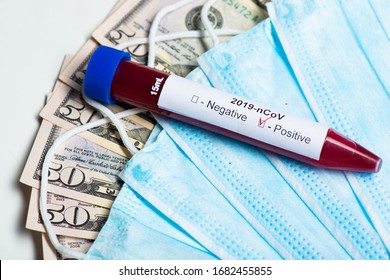 Corona Virus Covid-19 : Closeup Of Isolated Blood Sample Vial Ans Surgical Protection Face Mask On Us Dollar Paper Money Bank Notes