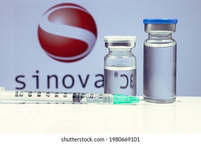 Corona Virus (Covid-19) Vaccine Syringe With Dose Of Vaccine Bottle Against Chinese Medical Company Sinovac Biotech Business Logo For Covid Editorial News Article.26 May 2021, Bangkok, THAILAND.