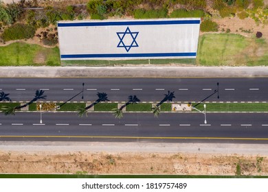 Corona Virus Second Lockdown, Empty Highway Road With Large National Flag Of Israel, South Of The City Of Nahariyya, Aerial View.