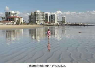 Coronado Beach CA/ USA 03/16/2018 Little Girl  Playing At The Beach, Coronado Beach California