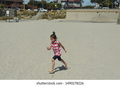 Coronado Beach CA/ USA 03/16/2018 Little Girl  Playing At The Beach, Coronado Beach California