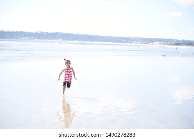 Coronado Beach CA/ USA 03/16/2018 Little Girl  Playing At The Beach, Coronado Beach California