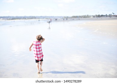 Coronado Beach CA/ USA 03/16/2018 Little Girl  Playing At The Beach, Coronado Beach California