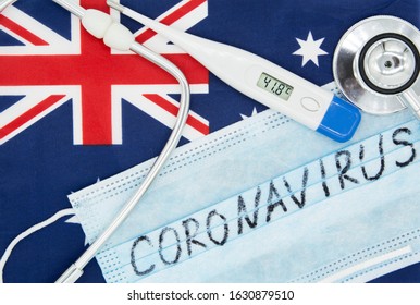 Coronavirus 2019-nCoV Concept. Top View Protective Breathing Mask, Stethoscope On Flag Of Australia.