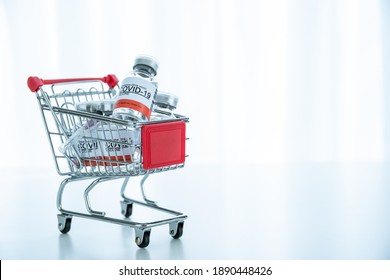 Coronavirus 2019-nCoV Or COVID-19 Vaccine Doses In A Shopping Cart With Copyspace, An Emergency And Urgent COVID19 Vaccine Distribution. COVID-19 Protection.