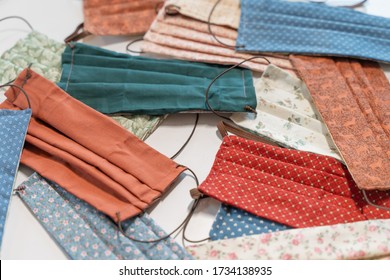 Coronavirus. Beautiful home made hygienic face medical mask to prevent infection, illness or flu and coronavirus. Sewing virus face mask. Textile DIY protection face mask. - Powered by Shutterstock