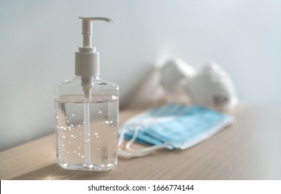 Coronavirus corona virus prevention travel surgical masks and hand sanitizer gel for hand hygiene spread protection. - Shutterstock ID 1666774144