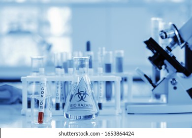 Coronavirus Covid 19 Infected Blood Sample In Sample Tube On Table In Corona Virus Covid 19 Research Laboratory, Coronavirus Covid 19 Vaccine Research