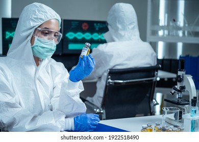 The Coronavirus or COVID vaccine researched by pharmaceutical bio research and development scientist team. The researcher work in laboratory room of covid-19 vaccine and drug manufacturing company.