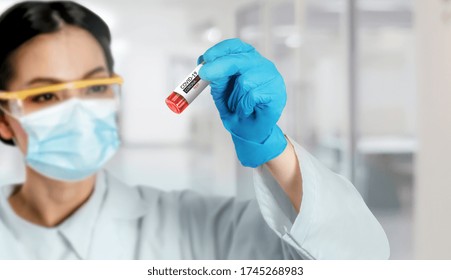 Coronavirus COVID-19 Medical Test Vaccine Research And Development Concept. Scientist In Laboratory Study And Analyze Scientific Sample Of Coronavirus Antibody To Produce Drug Treatment For COVID-19.