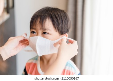 Coronavirus Covid19 Mother Wearing Mask For Asian Kid Toddler Boy Before Go To Take Vaccine.Back To School.school And Infected Disease.Travel Vacation.School Kid.Pediatric, Covid19 Omicron.health.