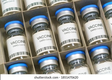Coronavirus COVID-19 vaccine. SARS-Cov-2 Ncov-2019 vaccine ampoules  in a box.