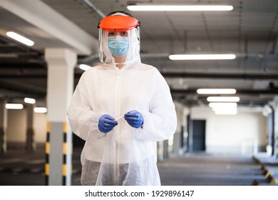 Coronavirus COVID-19 Virus Disease Global Pandemic Outbreak,UK NHS Frontline Medical Key Worker,EMS Personal Protective Equipment,parking Lot Hallway,emergency ICU Intensive Care Unit First Responder