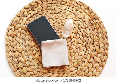 Coronavirus Desinfection. Wiping With Antibacterial Wipe. Clean Mobile Phone During Corona Virus Pandemic Quarantine. Covid 19 Concept.